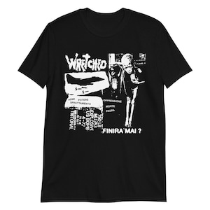 May include: Black t-shirt with a white graphic design. The design includes the word "Wretched", images, and text in multiple languages, including "Finira Mai?" and "US Bomb". The shirt is a short-sleeved, unisex garment.