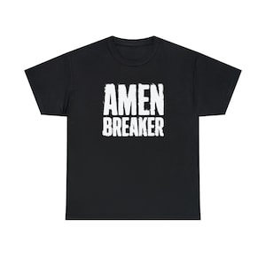 May include: Black t-shirt with white text that reads "AMEN BREAKER" in a distressed font.