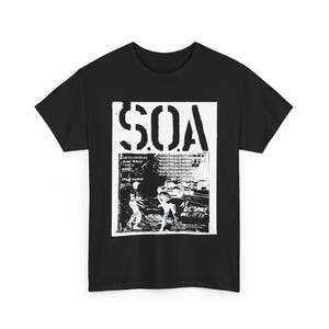 May include: Black t-shirt with a white print of a concert poster for SOA, featuring the band's name in large letters and a scene of people at a concert. The poster text reads "Untouchables, Mind Threat, Type O Negative, Vile Assassins, At DC Spike, Dec 17 '18".