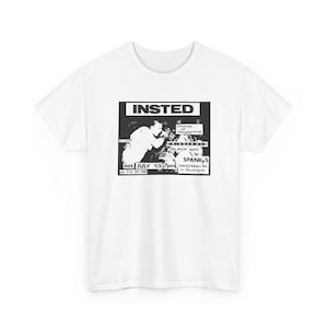 May include: White t-shirt featuring a black and white graphic. The graphic includes the band name "INSTED", a concert date, and the venue "SPANKY'S" in Riverside. The shirt has a classic crew neck design.