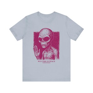 Aliens Are Real Tee-Shirt, We Cxme In Pexce, Unisex Jersey Short Sleeve Tee, Bella Canvas 3001, Multiple Colorways