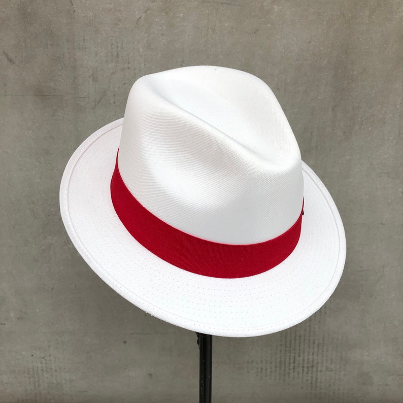 white fedora hat with red band and short brim, sturdy hat