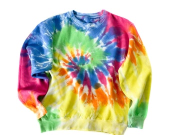 May include: A tie-dye sweatshirt with a colorful swirl pattern in shades of blue, green, yellow, orange, pink, and red.