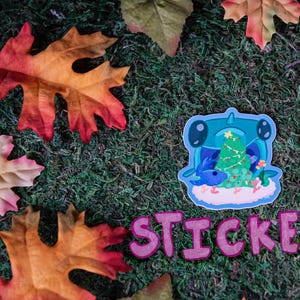 Een Sharky-kerststicker