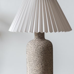 Minimalist ceramic table lamp, pleated white lampshade and grey raw matt ceramic base, minimal home decor image 2