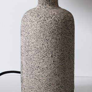 Minimalist ceramic table lamp, pleated white lampshade and grey raw matt ceramic base, minimal home decor image 4