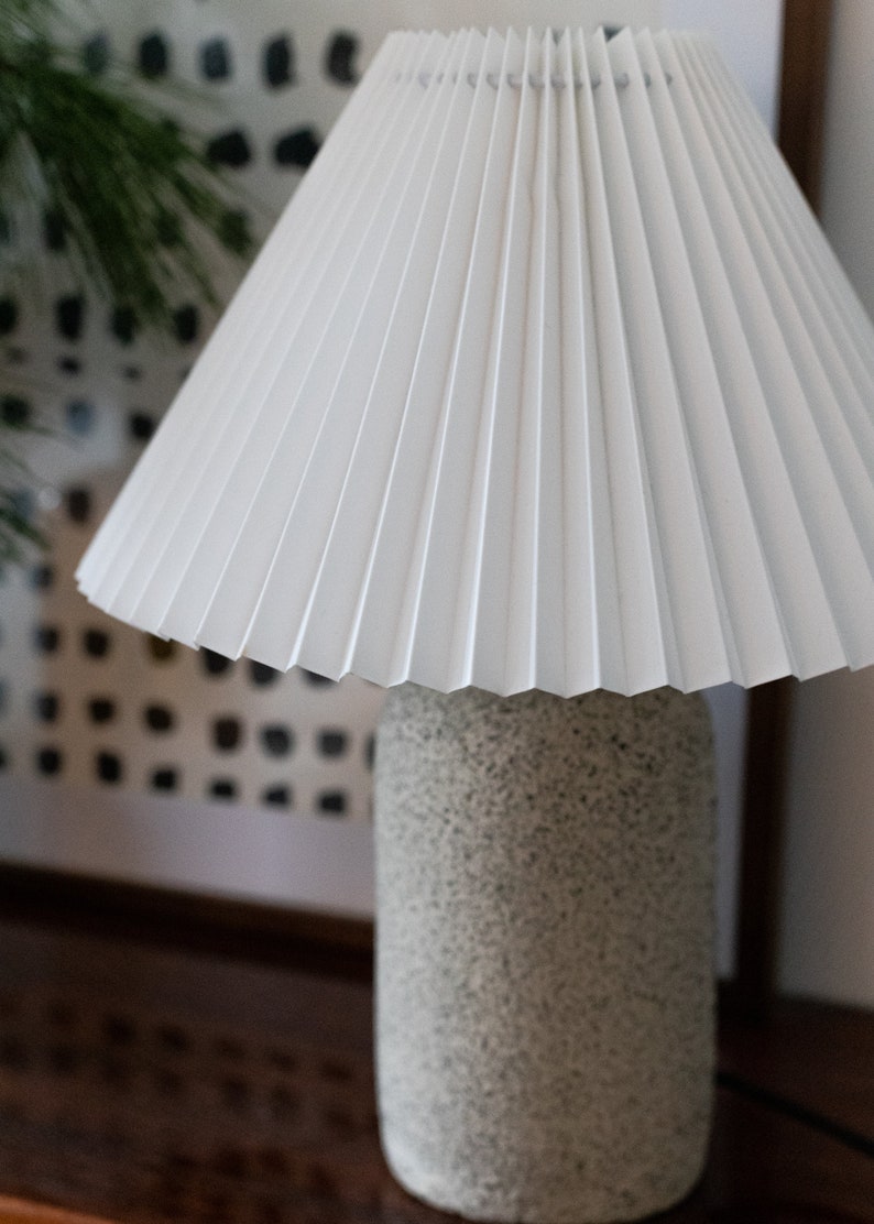 Minimalist ceramic table lamp, pleated white lampshade and grey raw matt ceramic base, minimal home decor image 5