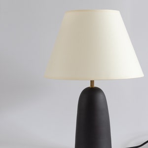Black ceramic table lamp with smooth ecru fabric lampshade, minimal matt ceramic base, japandi interior design, bedside lamp, home decor image 3
