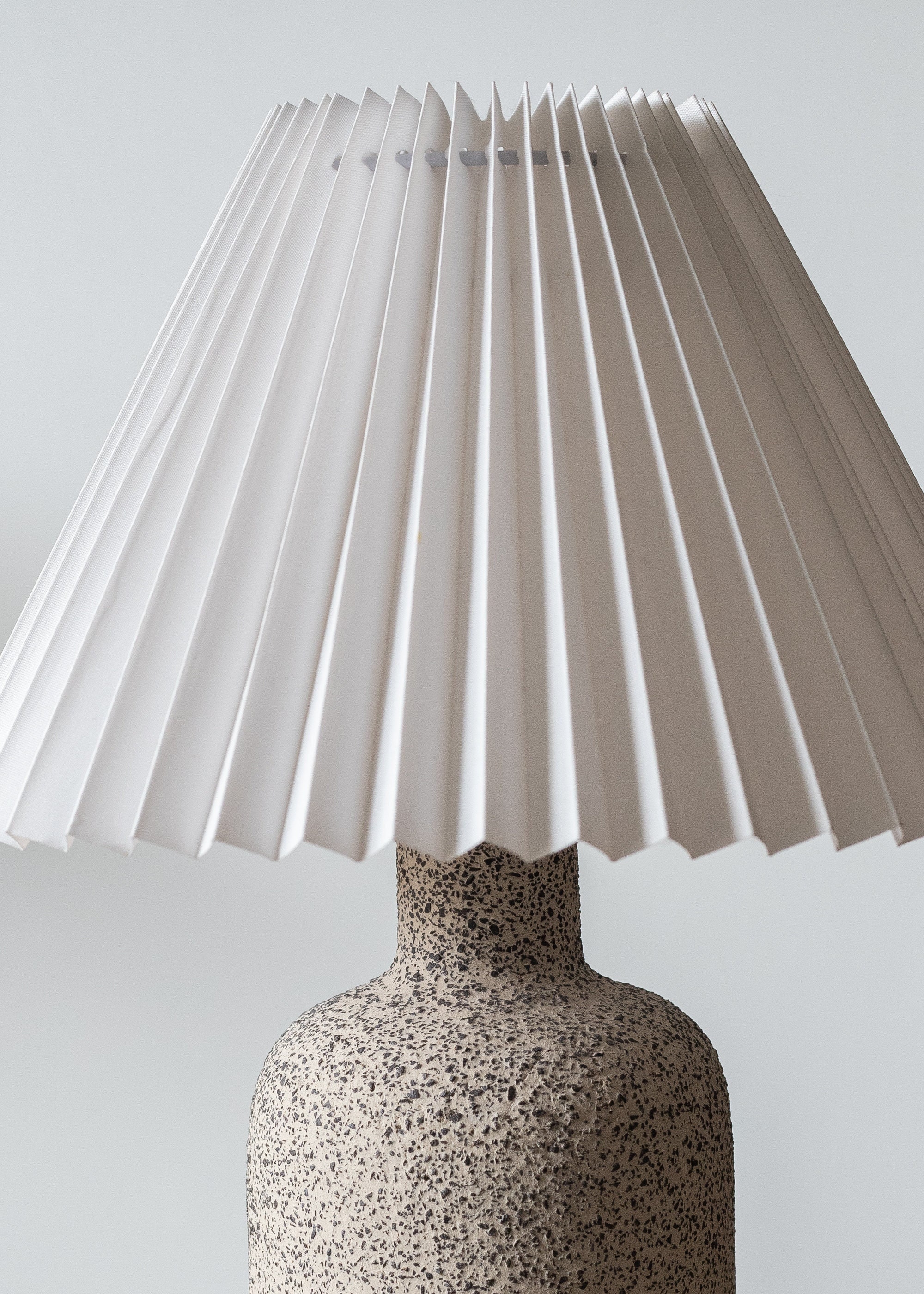 Minimalist Ceramic Table Lamp with Pleated White Lampshade Grey Raw Matt Base