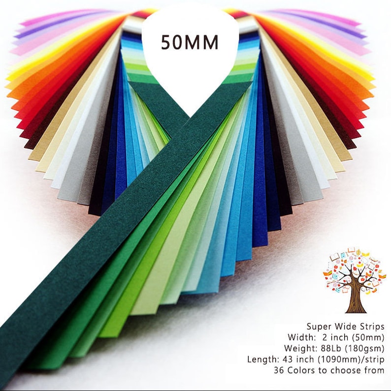 May include: A fan of 36 colorful paper strips, each 2 inches wide and 43 inches long. The strips are arranged in a fan shape, with the green strip in the center. The text "50MM" is visible at the top of the image. The text "Super Wide Strips" is visible at the bottom of the image, along with the dimensions and weight of the strips.