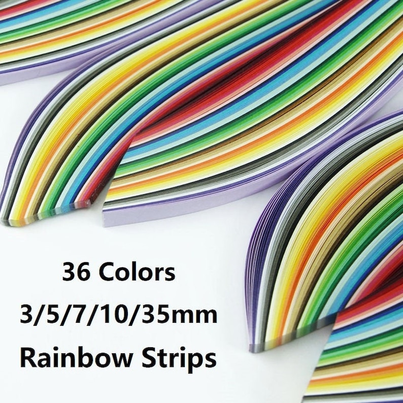 May include: 36 colors of rainbow paper strips in various widths, including 3/5/7/10/35mm. The strips are arranged in a fan shape, with the colors blending together to create a rainbow effect.
