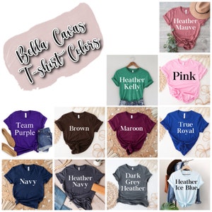 May include: A collection of Bella Canvas t-shirts in various colors, including Heather Mauve, Pink, Heather Kelly, Team Purple, Brown, Maroon, True Royal, Navy, Heather Navy, Dark Grey Heather, and Heather Ice Blue.