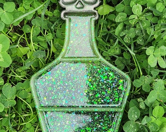 Potion bottle shelf green and black.