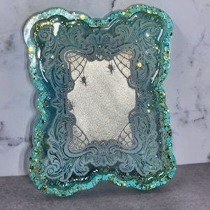 Spooky frame turquoise trinket tray.