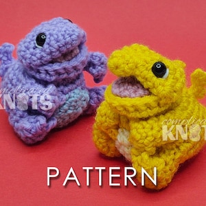 May include: Two crocheted dinosaur toys, one purple and one yellow, sit on a red background. The purple dinosaur has a light blue belly, and the yellow dinosaur has a pink mouth. The text "PATTERN" is at the bottom.