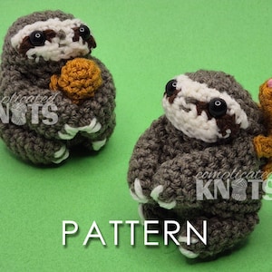 May include: Two handmade crochet sloths in shades of gray, brown, and white, with black eyes and a mustard-colored detail. The sloths are on a green background. The word "PATTERN" is displayed in white text.