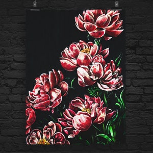 May include: A dark background with a cluster of red peonies with white accents. The peonies are arranged in a cascading pattern with green leaves.