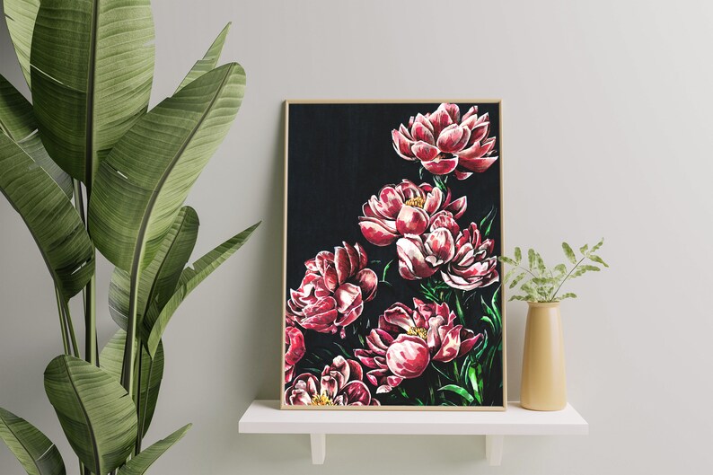 May include: A framed print of a floral painting featuring pink peonies on a black background.