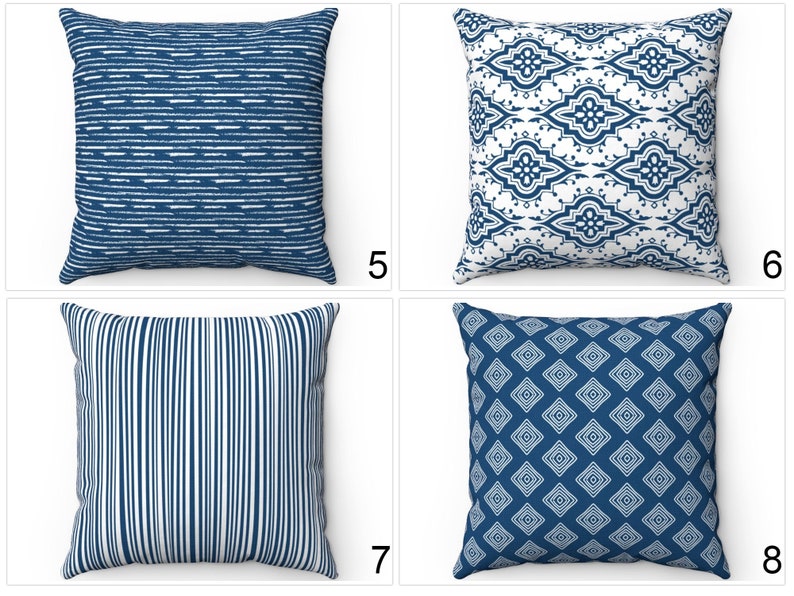 May include: Four different blue and white patterned throw pillows. The pillows are all square and have a variety of geometric designs. The pillows are numbered 5, 6, 7, and 8.