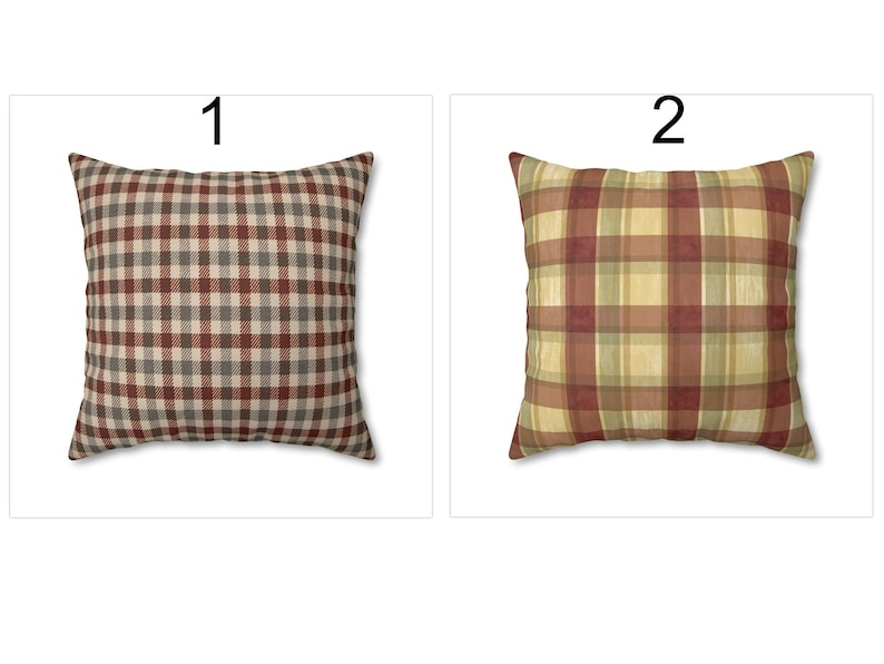 May include: Two square throw pillows with plaid patterns. Pillow 1 features a brown, gray, and beige checkered design. Pillow 2 displays a plaid pattern in shades of red, yellow, and green. Both pillows are on a white background.