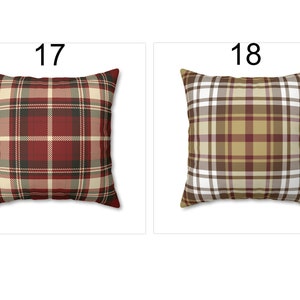 May include: Two square throw pillows with plaid patterns. Pillow 17 features a red, beige, and black plaid design. Pillow 18 has a brown, white, and burgundy plaid pattern. The pillows are displayed on a white background.