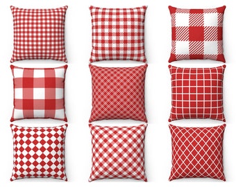 May include: Nine square throw pillows with red and white patterns. The patterns include gingham, plaid, and diamond designs. The pillows are square and have a soft, textured appearance, perfect for home decor.