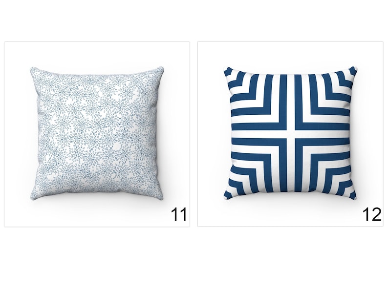 May include: Two decorative throw pillows. The first pillow has a white background with a blue floral pattern. The second pillow has a white background with a blue geometric pattern.