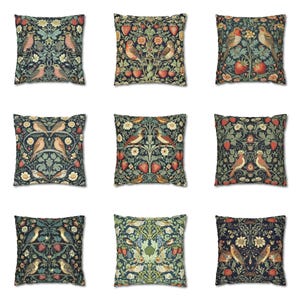 May include: Nine square throw pillow covers with a dark blue background featuring a floral pattern with birds, strawberries, and leaves. The pillows are all the same size and have a square shape.