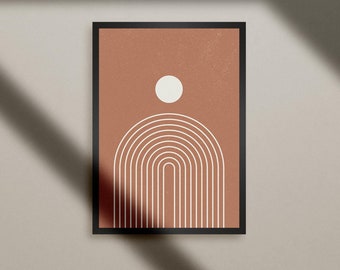 Puede incluir: Una impresión enmarcada con un diseño minimalista que presenta un círculo blanco y una serie de arcos blancos sobre un fondo terracota.