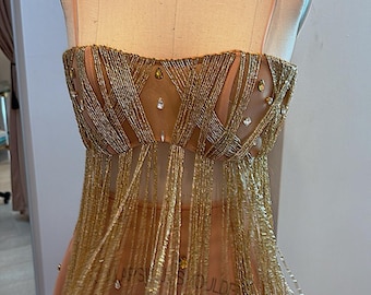 Top corto con flecos dorados