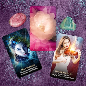 May include: A collection of oracle cards and crystals on a purple, glittery surface. The cards display images of a woman, a flower, and a violinist. Text on the cards includes "MIDNIGHT ORACLE", "THE VISIONARY", and "THE ENCHANTRESS".