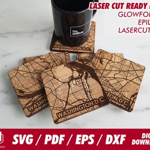 May include: Set of four wooden coasters featuring a laser-cut map of Washington D.C. The coasters are made of light brown wood and have a natural wood finish. The map is detailed and includes major streets and landmarks. The coasters are perfect for adding a touch of personalisation to your home decor.