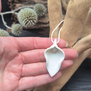 White yoni pendant on a leather cord, Women's necklace, Feminism symbol necklace, Gift for lesbian