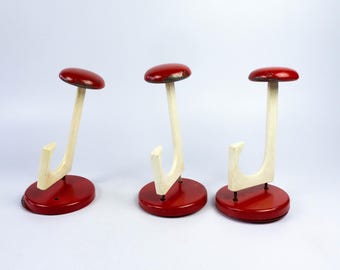 Three old vintage coat hooks, 60 years old, usable, clear signs of wear, shabby chic, metal and plastic in red and white
