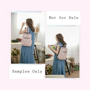 May include: A pink floral patterned backpack with brown straps. The backpack is being worn by a person in a blue dress. The text "Not for Sale" and "Samples Only" is visible in the image.