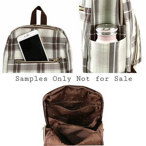 May include: A brown and white plaid backpack with a zipped pocket on the front. The backpack has a brown leather handle and a zipped pocket on the side. The inside of the backpack is brown with a polka dot pattern and has multiple zipped pockets.