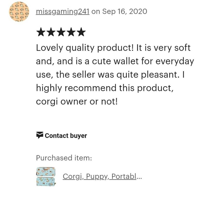 May include: Five star review for a cute wallet featuring a Corgi dog design. The review states "Lovely quality product! It is very soft and, and is a cute wallet for everyday use, the seller was quite pleasant. I highly recommend this product, corgi owner or not!"