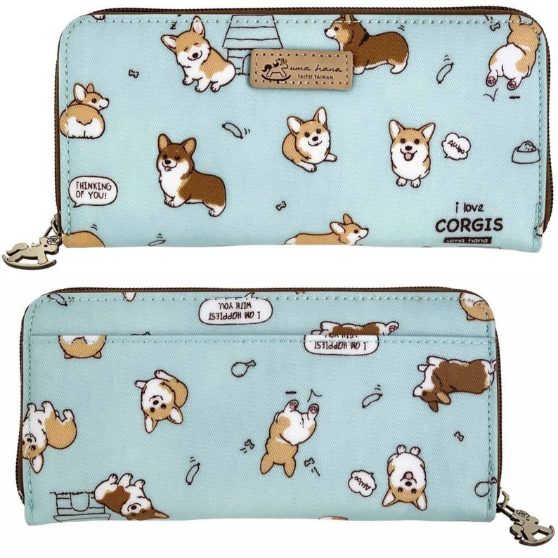 May include: A light blue zippered wallet with a repeating pattern of brown and white corgis. The wallet has a brown leather tag with the text "uma hana" and "TAIPEI TAIWAN". The text "I love corgis" and "uma hana" is printed on the bottom right corner of the wallet.