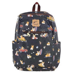 May include: A black backpack featuring a colourful pattern of corgis surfing, driving cars, and relaxing on the beach. The backpack has a brown zipper and a brown handle.