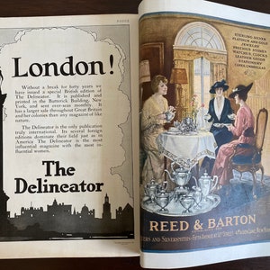 May include: A vintage magazine spread featuring an advertisement for The Delineator with a silhouette of Nelson's Column and a Reed & Barton advertisement showing three people at a table with silver tea service and text listing jewelry and watches.