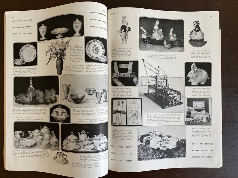 May include: A magazine page featuring a variety of products, including china teacups, glassware, toys, and a model of a tank. The page is titled "China to Compensate for War Time Deprivation" and "It is the Pleasure of the War to You" with the text "Toys that will furnish Interest and Intrigue".