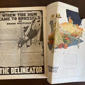 May include: A magazine page with a black and white illustration of a bayonet and a text article titled "When the Hun Came to Brussels" by Brand Whitlock. The article discusses the German invasion of Belgium during World War I. The opposite page features a color illustration of a woman in a floral dress buying flowers from a street vendor. The text on this page reads "In Cheney Silks, Paris's foremost designers will lend the new season of Cheney Silkship the same brand of other fabrics. But it is the fusion of all the new Cheney Silks and our charming designs that bring the final discovery of design, and the possibilities for those who want to look, but do a scarcely ground."