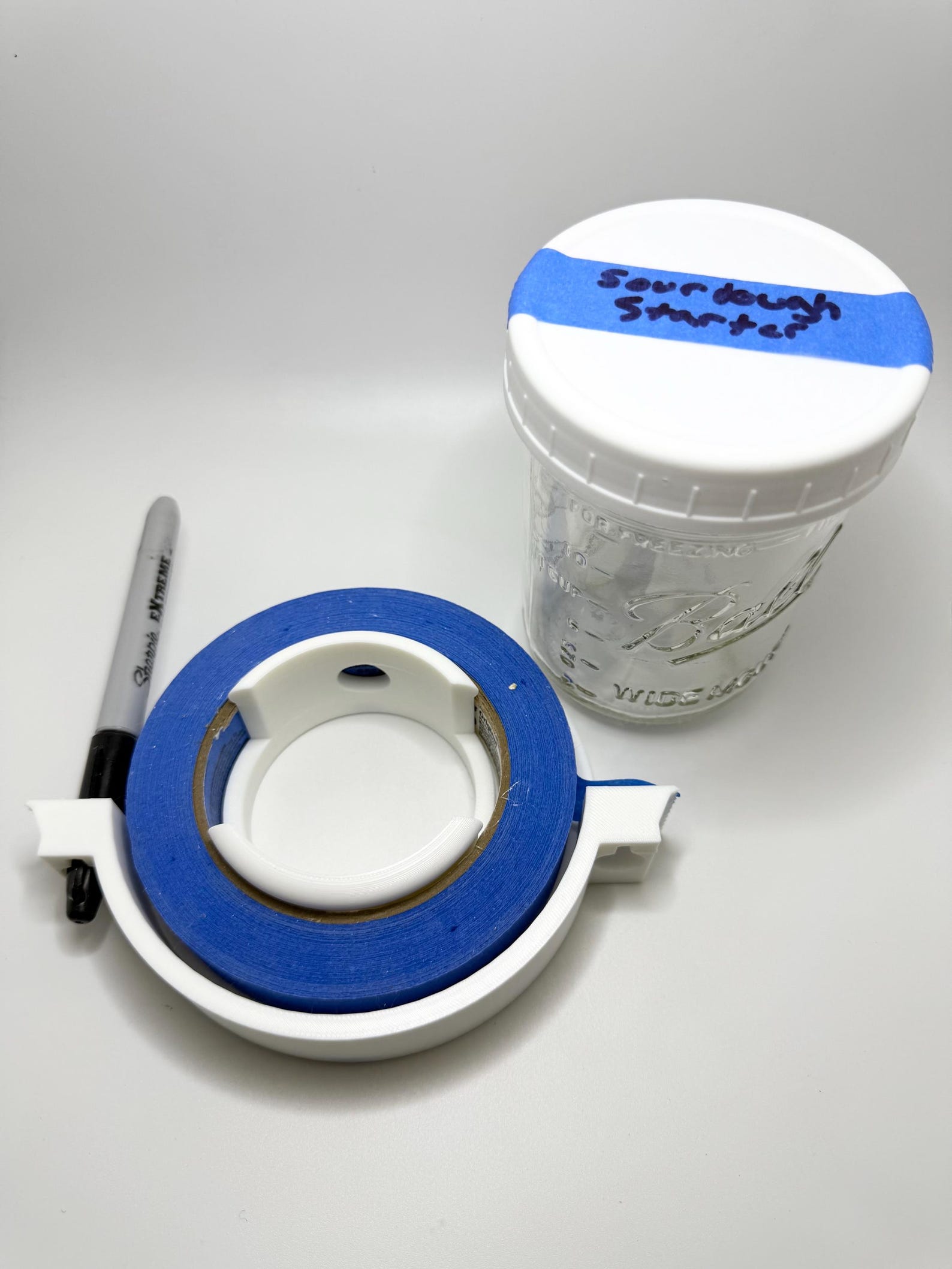 Magnetic kitchen tape dispenser. A complete labeling system!