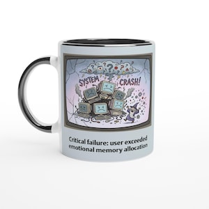 May include: White ceramic mug with a black handle and rim. The mug features a cartoon illustration of a computer system crash, with the text "SYSTEM CRASH!" and "Critical failure: user exceeded emotional memory allocation."