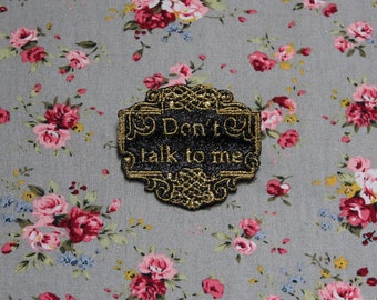 Brooch jewel Don't talk to me "The precious distinguished baroque" sequined fabric black embroidery message in English golden thread made in France