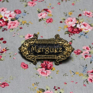 Brooch jewel Merguez The precious distinguished baroque fabric black sequins message embroidered in Arabic golden thread made in France image 1