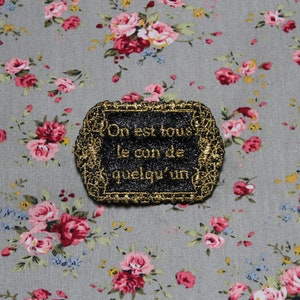 Brooch We are all someone&#39;s idiot &quot;The precious distinguished baroques&quot; black sequins message embroidered French thread gold made in France