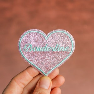 Broche borderline tela en forma de corazón brillo rosa tierno hilo de rosca color mentol verde almendra