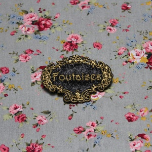 Broche joya Foutaises &quot;Los preciosos barrocos distinguidos&quot;, tela de lentejuelas negras, mensaje bordado en hilo de oro francés, fabricado en Francia.