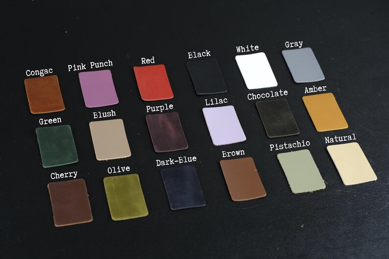May include: Leather swatches in various colors, including cognac, pink punch, red, black, white, gray, green, blush, purple, lilac, chocolate, amber, cherry, olive, dark blue, brown, pistachio, and natural.